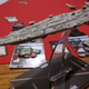 You can assign “hero” cards to your fleet, granting a unique set of perks or abilities.